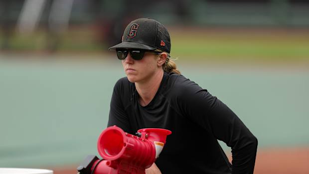SF Giants major league assistant coach Alyssa Nakken (92) before a game against the Arizona Diamondbacks. (2022)